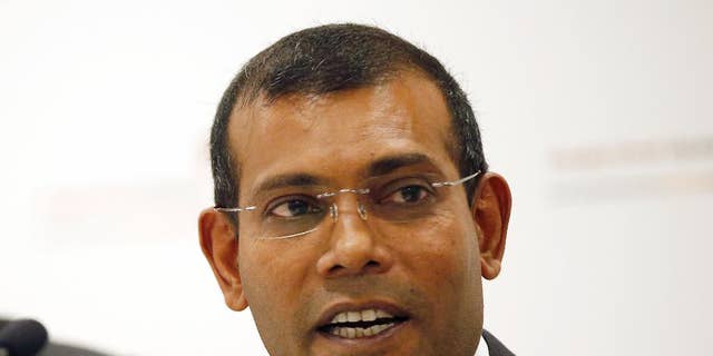 FILE - In this Monday, Jan. 25, 2016, file photo, former Maldives president Mohamed Nasheed speaks during a press conference in London. Nasheed, the first democratically elected president of the Maldives, said Tuesday from exile in Britain that he has an agreement with the country's former strongman Maumoon Abdul Gayoom to counter the current president President Yameen Abdul Gayoom, who is increasing his stranglehold on power. (AP Photo/Alastair Grant, File)