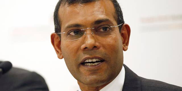 FILE - In this Monday, Jan. 25, 2016, file photo, former Maldives president Mohamed Nasheed speaks during a press conference in London. Nasheed, the first democratically elected president of the Maldives, said Tuesday from exile in Britain that he has an agreement with the country's former strongman Maumoon Abdul Gayoom to counter the current president President Yameen Abdul Gayoom, who is increasing his stranglehold on power. (AP Photo/Alastair Grant, File)