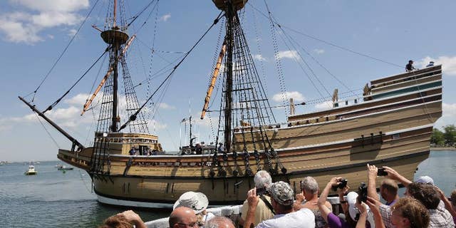 People watch as the Mayflower II arrives in Plymouth Harbor on June 6, 2016, in Plymouth, Mass. The 1957 replica of the famed ship that carried the Pilgrims to Massachusetts in 1620 underwent an extensive restoration at the Henry B. DuPont Preservation Shipyard, at Mystic Seaport, in Mystic, Conn., in the run-up to Plymouth's 400th anniversary in 2020.