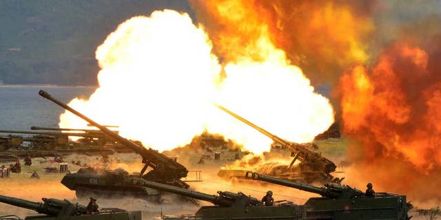 This photo distributed on Wednesday, April 26, 2017, by the North Korean government, shows what was said to be a "Combined Fire Demonstration" held to celebrate the 85th anniversary of the North Korean army, in North Korea. Independent journalists were not given access to cover the event depicted in this image distributed by the Korean Central News Agency via Korea News Service. (Korean Central News Agency/Korea News Service via AP)
