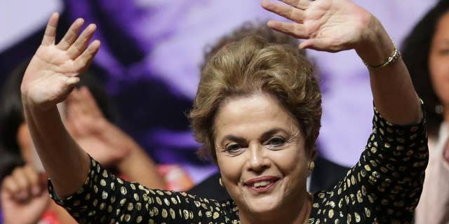 May 10, 2016: Brazil's President Dilma Rousseff waves to the crowd during the opening of the National Conference of Women, in Brasilia.