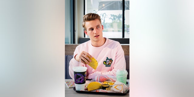 "Live Mas" in this Taco Bell sweatshirt