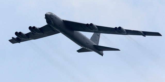 File photo - A Boeing B-52 Stratofortress strategic bomber from the United States Air Force (USAF) Andersen Air Force Base in Guam performs a fly-past during an aerial display at the Singapore Airshow in Singapore February 14, 2012. (REUTERS/Tim Chong)