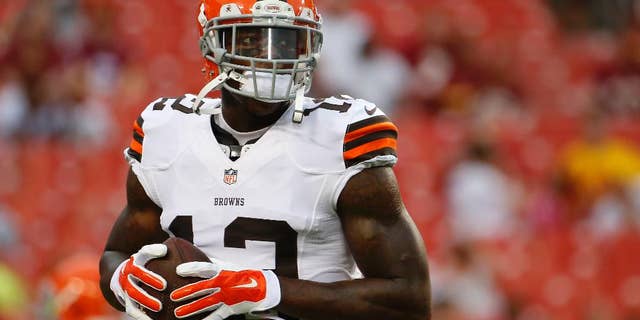 FILE - In this Aug. 18, 2014, file photo, Cleveland Browns wide receiver Josh Gordon warms up before an NFL preseason football game against the Washington Redskins in Landover, Md. Gordon's 10-game suspension for repeated violations of the NFL's drug policy is set to end Monday, Nov. 17 when the Pro Bowler will be allowed to rejoin his teammates after being exiled since September. (AP Photo/Evan Vucci, File)
