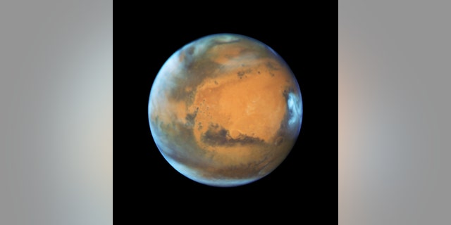 Mars is shown May 12, 2016 in this NASA Hubble Space Telescope view taken when the planet was 50 million miles from Earth. (NASA/Handout via Reuters)