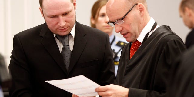 April 23: Anders Behring Breivik (left), and his defence lawyer Geir Lippestad during the morning break on day 6 of the trial in Oslo.