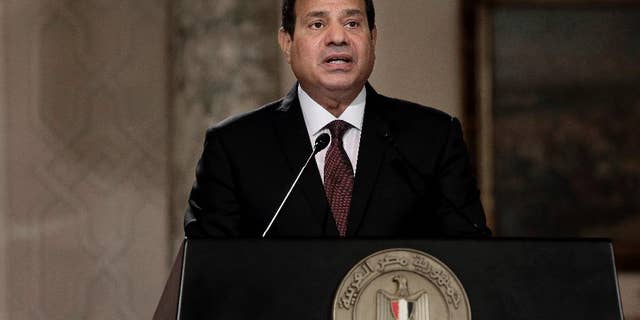FILE -- In this June 1, 2016 file photo, Egyptian President Abdel-Fattah el-Sissi, speaks during a press conference with Hungarian Prime Minister Viktor Orban at the presidential palace in Cairo, Egypt. Egypt has blasted the EU and Britain for criticizing a recent court decision to freeze the assets of three rights activists, accusing them of double standards and telling them to mind their own business. (AP Photo/Nariman El-Mofty, File)