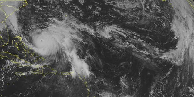 This NOAA satellite image taken Saturday, Oct. 3, 2015 at 09:45 AM EDT shows major hurricane Joaquin, located east of the Bahamas and moving towards the northeast with maximum sustained winds of 155 miles per hour. Clouds with rain and thunderstorms are affecting Cuba and Haiti, Puerto Rico, and the northern Virgin Islands. (Weather Underground via AP)