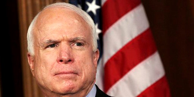 FILE - In this March 28, 2012 file photo, Sen. John McCain, R-Ariz. listens during a news conference on Capitol Hill in Washington. The Republican National Committee has announced that McCain will be one of the speakers at the 2012 GOP Convention in Tampa. (AP Photo/Jacquelyn Martin, File)
