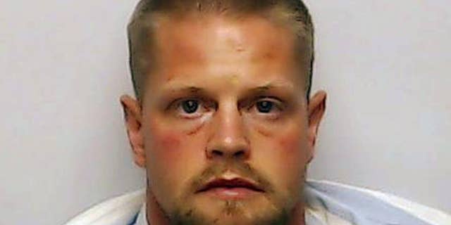 This photo provided May 5, 2015 by the Clark County, Indiana., Sheriff's Office shows Joseph Oberhansley, 37. A judge on Monday, May 4, 2015 added the charge of rape for the Indiana man who is accused of killing his ex-girlfriend and eating some of her internal organs. (Clark County Sheriff's Office via AP)