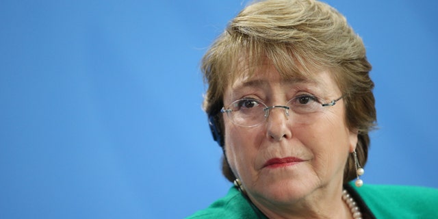 BERLIN, GERMANY - OCTOBER 27:  Chilean President  Michelle Bachelet speaks to the media with German Chancellor Angela Merkel (not pictured) following talks at the Chancellery on October 27, 2014 in Berlin, Germany. Bachelet is on a two-day official visit to Germany, which includes a visit to Dresden, where Bachelet studied medicine as a student.  (Photo by Sean Gallup/Getty Images)