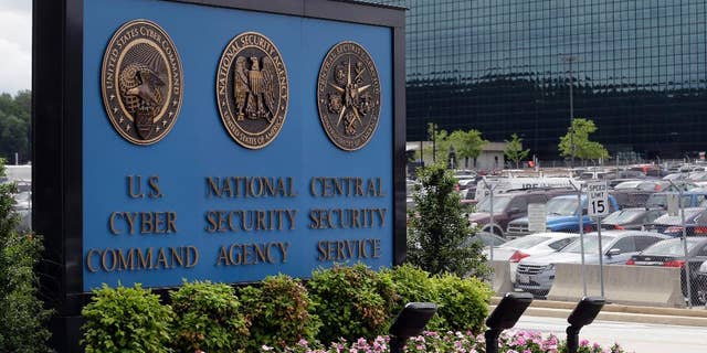 FILE - This June 6, 2013 file photo shows the sign outside the National Security Agency campus in Fort Meade, Md. The House is poised to take the first significant step to change the National Security Agency’s bulk collection of American phone records, a compromise bill that is displeasing many civil liberties activists. The bill, scheduled for a House vote on May 22, 2014, instructs the phone companies to hold the records for 18 months and let the NSA search them in terrorism investigations in response to a judicial order. (AP Photo/Patrick Semansky, File)