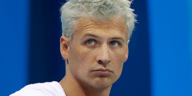 United States' Ryan Lochte prepares before a men's 4x200-meter freestyle heat during the swimming competitions at the 2016 Summer Olympics, Tuesday, Aug. 9, 2016, in Rio de Janeiro, Brazil. (AP Photo/Michael Sohn)