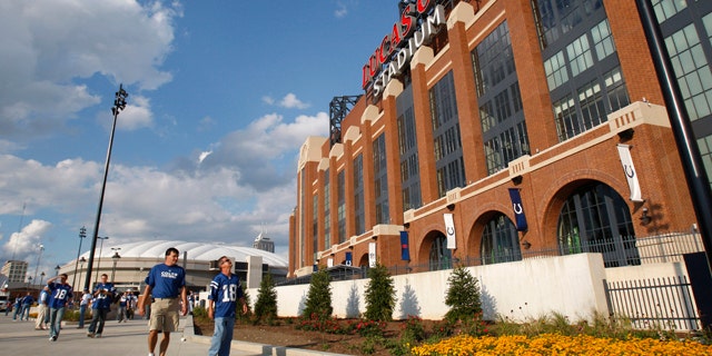 Sept. 7, 2008: Fans pass the new home of the Indianapolis Colts, Lucas Oils Stadium.