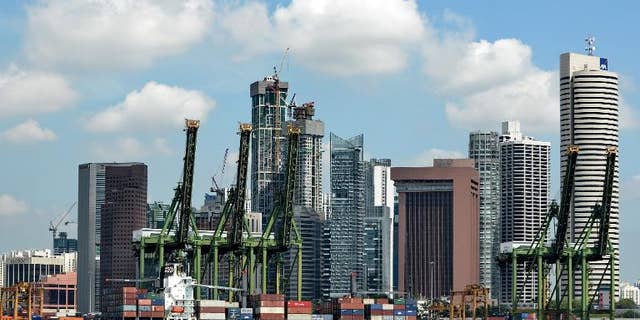 The Keppel container port next to the financial district in Singapore on April 12, 2013