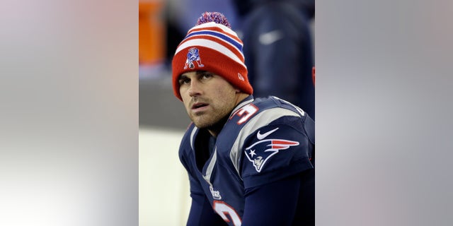 FILE - In this Nov. 3, 2013 file photo, New England Patriots kicker Stephen Gostkowski (3) watches from the bench in the fourth quarter of an NFL football game against the Pittsburgh Steelers, in Foxborough, Mass. Gostkowski sings on the sideline when he's getting ready to kick. On Saturday night, ,Jan. 11, 2014, he could be in full voice and in position to beat the Indianapolis Colts. (AP Photo/Steven Senne, File)