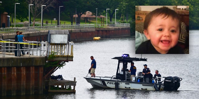 Authorities continue a search of the Connecticut River for a missing child, Monday, July 6, 2015, in Middletown, Conn. Police issued an alert Monday for 7-month-old Aaden Moreno, who may have been with his father when the man jumped from the Arrigoni Bridge Sunday night. (Catherine Avalone/The New Haven Register via AP) MANDATORY CREDIT