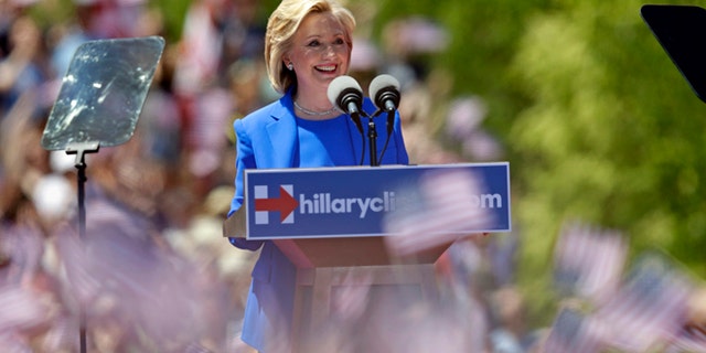 Democratic presidential candidate, former Secretary of State Hillary Rodham Clinton speaks to supporters Saturday, June 13, 2015, on Roosevelt Island in New York, in a speech promoted as her formal presidential campaign debut. (AP Photo/Frank Franklin II)
