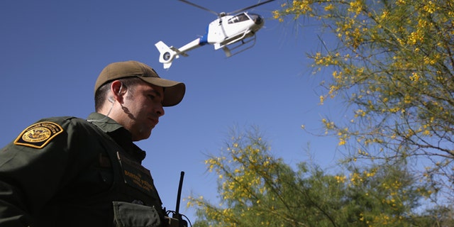 A U.S. Border Patrol agent along the Rio Grande River on April 11, 2013 in Mission, Texas. (Photo by John Moore/Getty Images)