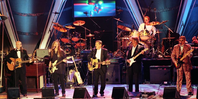 The Eagles perform at the band's induction into the Rock and Roll Hall of Fame on Jan. 13, 1998. Band members are (L-R) Randy Meisner, Timothy B. Schmidt, Glen Frey, Don Felder, Joe Walsh and Don Henley (rear). REUTERS