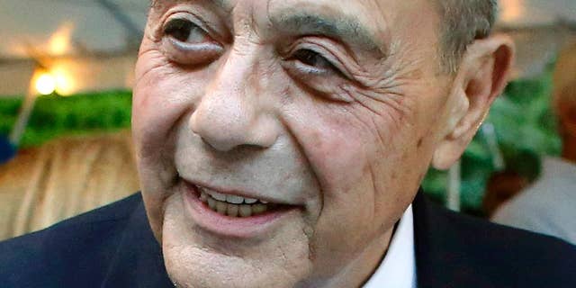 FILE - This Sept. 10, 2014, file photo shows former Providence, R.I., Mayor Buddy Cianci, who died at age 74 on Jan. 28, 2016, in Providence. Cianci held office for more than 21 years, but was forced from his seat twice due to felonies. He left behind several ventures, including his self-branded pasta sauce, a scholarship fund and plans for a library to house 40 years’ worth of memorabilia. (AP Photo/Steven Senne, File)