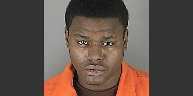 This photo provided by the Hennepin County, Minn. sheriff’s office shows Devon Parker. Prosecutors have charged Parker, 20, of Minneapolis, with murder for fatally shooting a homeowner who tried to help him. (AP Photo/Hennepin County Sheriff)