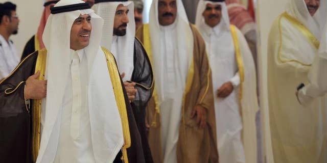 Saudi deputy Interior Minister Ahmed al-Salem (left) and his counterparts arrive to attend a meeting of deputy interior ministers of the Gulf Cooperation Council on September 15, 2013 in Riyadh