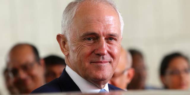 FILE - In this April 11, 2017, file photo, Australian Prime Minister Malcolm Turnbull takes a tour during a four day visit in Mumbai, India. More than two months after President Donald Trump got into a spat with Turnbull, Vice President Mike Pence will be working to smooth over any lingering hard feelings with the longtime US ally. Pence will meet with the prime minister on Saturday as part of his trip to Asia. (AP Photo/Rajanish Kakade, File)