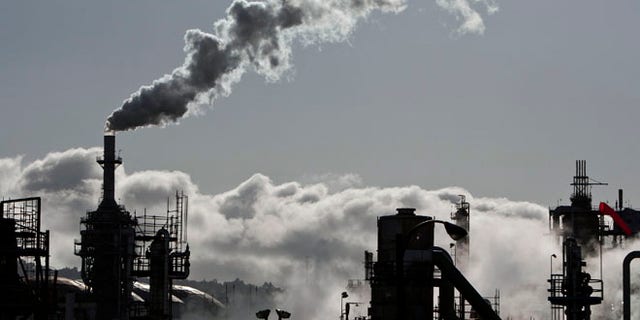 March 24, 2012: Smoke is released into the sky at a refinery in Wilmington, California.