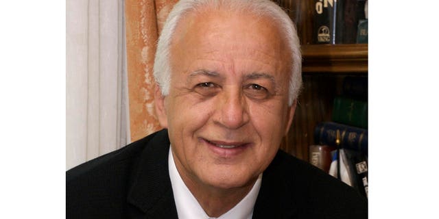 Ari Babaknia hopes his four-volume book, "Holocaust," tells the true story to Iranians who have been told the event never happened.