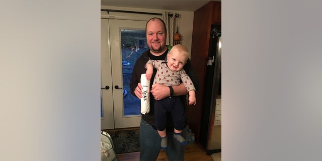 Brad Williams used a foolproof system he calls "Cheesesteak for Scale" to measure the growth of his son during the child's first year in 2015.