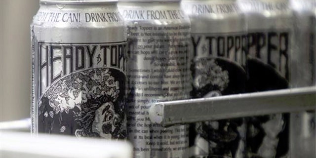 Cans of Heady Topper roll off the line at the Alchemist Cannery in Waterbury, Vt.