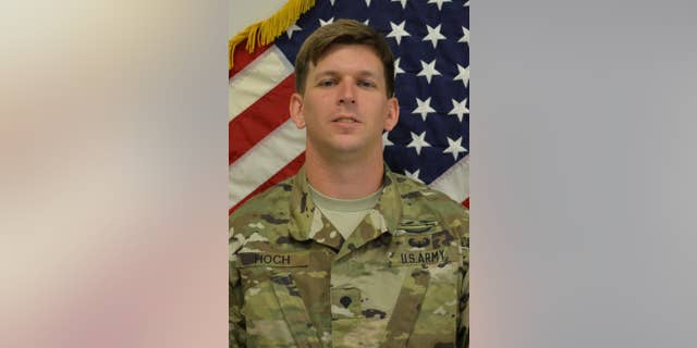 This image provided by the US Army shows Christopher Hoch. Kentucky State Police say in a statement it appears 35-year-old Jeremy Demar of Clarksville, Tennessee, was in a domestic dispute with his estranged wife, 32-year-old Priscilla Ann East, and found her at a home in Oak Grove, Kentucky, where he forced his way in Thursday night and fatally shot her and 28-year-old Hoch. (US Army via AP)
