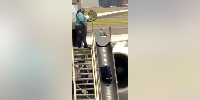 Social media commentators both slammed and supported the airport worker's actions.