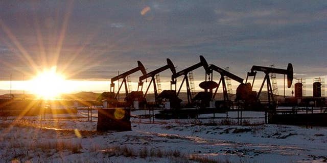 Oil derricks at the Bakken shale formation in North Dakota.
