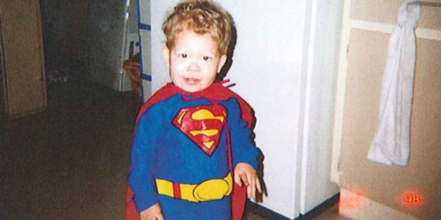 Jeffrey Baldwin is seen in a Halloween costume in this undated handout photo released at the inquest into his death last year. DC Entertainment is reportedly refusing to allow a memorial statue of Baldwin to feature the logo.