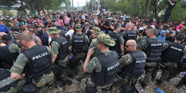 Police in Macedonia hold back hordes of refugees hoping to pass through the Balkans en route to Western Europe. (FoxNews.com)