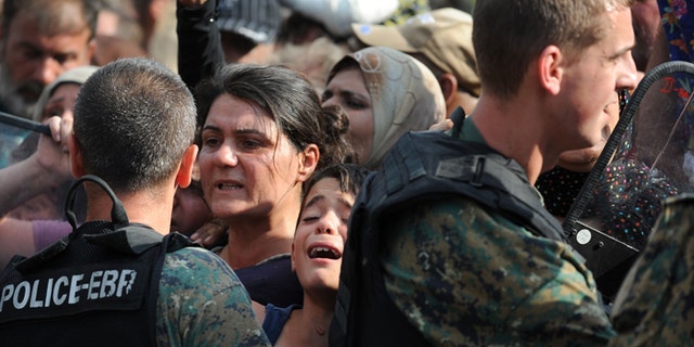 With Western Europe closing its doors, thousands of refugees are stranded along the path from Middle East misery. (FoxNews.com)