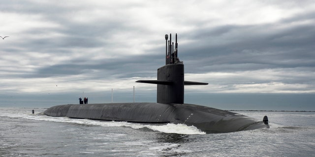 File photo - The Ohio-class ballistic missile submarine USS Tennessee returns to Naval Submarine Base Kings Bay, Georgia in this Feb. 6, 2013 handout photo. (REUTERS/Mass Communication Specialist 1st Class James Kimber/U.S. Navy/Handout via Reuters)
