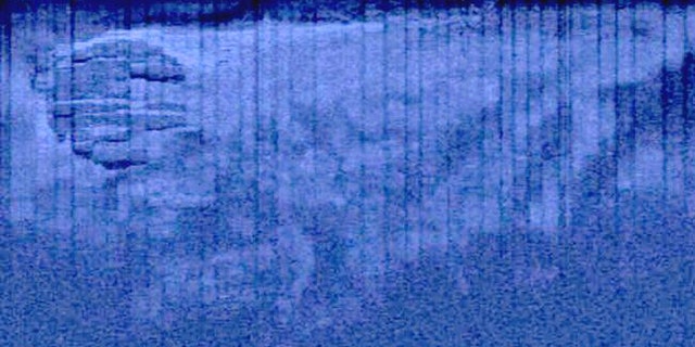 Team Ocean Explorer said this image shows 300m "drag marks" around an unidentified -- possibly flying -- object.