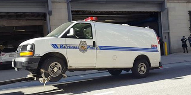 The Baltimore police van Freddie Gray was transported in the day of his arrest and injury is moved to the Courthouse East garage prior to being shown to jurors in the trial of officer William Porter on Thursday, Dec. 3, 2015 in Baltimore. Jurors did not ask any questions about the van when they inspected it, and were not given any information about it during the viewing, Baltimore Circuit Judge Barry Williams said. Reporters and members of the public were not allowed to witness the jurors' viewing. (Ian Duncan/The Baltimore Sun via AP) WASHINGTON EXAMINER OUT; MANDATORY CREDIT