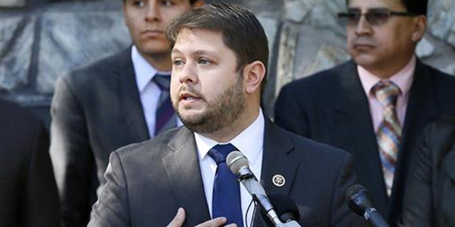 In this Feb. 17, 2015 file photo, Rep. Ruben Gallego, D-Ariz., speaks at an immigration rally in Phoenix. The Republican-led House on Thursday, June 16, 2016, narrowly defeated an attempt to bar young immigrants living in the country illegally to enlist in the armed forces, as opponents tied the measure to Donald Trump's presidential campaign. Gallego said: “I am glad to see that some Republicans are rejecting the tired, anti-immigrant policies promoted by the likes of Donald Trump."(AP Photo/Matt York, File)