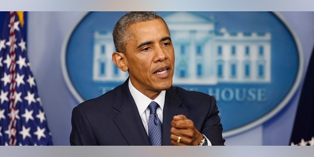 U.S. President Barack Obama makes a statement while at the White House in Washington, August 1, 2014. REUTERS/Larry Downing (UNITED STATES - Tags: POLITICS) - RTR40YOC