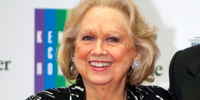 In this Dec. 7, 2013 file photo, Barbara Cook arrives at the State Department for the Kennedy Center Honors gala dinner in Washington. Cook, whose shimmering soprano made her one of Broadway's leading ingenues and later a major cabaret and concert interpreter of popular American song, has died.