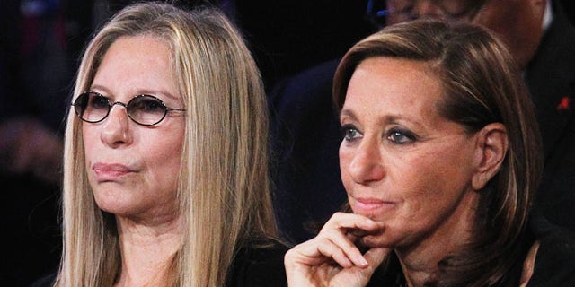 Barbra Streisand and designer Donna Karan at a political event.
