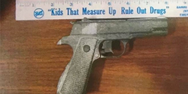 Coulson was brandishing a replica pistol when he barged into Northeast Pizza, police confirmed.