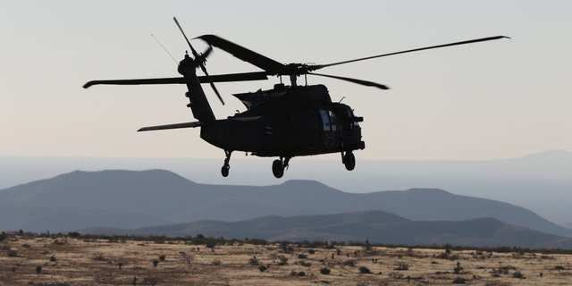 UH-60 Blackhawk helicopter crews from 3rd Battalion, 501st Aviation Regiment, Combat Aviation Brigade, 1st Armored Division completed aerial gunnery at Fort Bliss, Texas, December 12, 2017, maintaining their combat readiness and M240 machine gun skills. (U.S. Army photos by Capt. Tyson Friar, 1st Armored Division Combat Aviation Brigade Public Affairs)