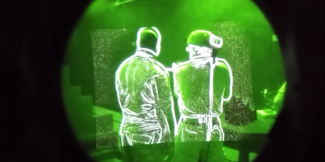 M4 rifle equipped with an FWS-I sight fired while wearing helmet equipped with an ENVG III night vision goggle at Fort Belvoir, Virginia. The FWS-I wirelessly transmits its sight picture to the ENVG III, allowing a shooter to see what the sight sees, without having to shoulder the weapon. (Credit: US Army)