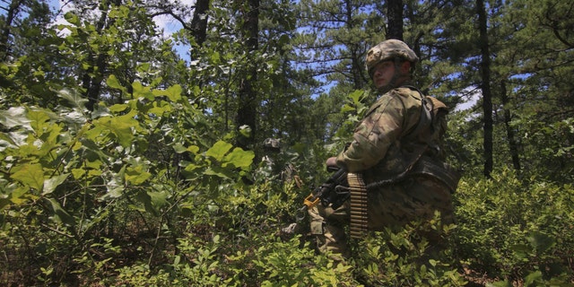 File photo - a U.S. soldier with an M249 SAW (U.S. Army)