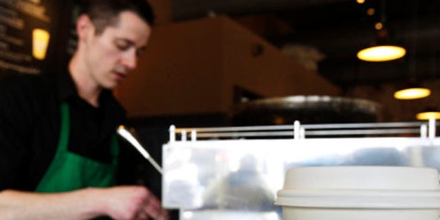 Starbucks says a digital tip function will be added to its mobile payment application starting next summer.